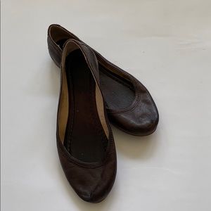 Brown leather flats